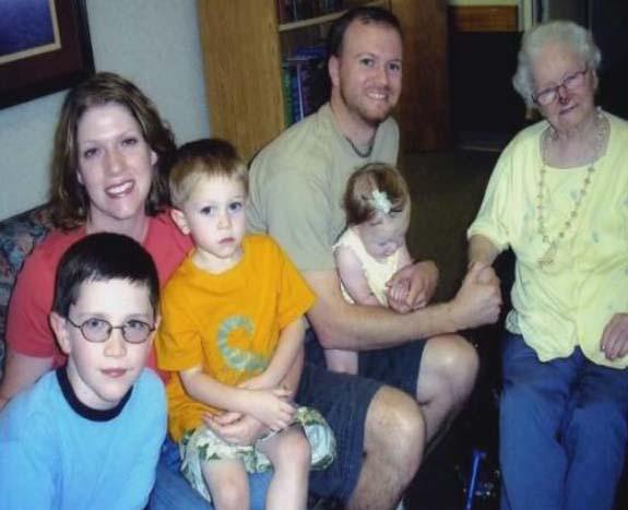 Kameron, Anne, Ethan, Kristian, Charlotte, Mary Ann Front, Kameron Avery, Anne Avery Koellner, Ethan Matthew Koellner, Kristian Matthew Koellner holding Charlotte Faith Koellner with Mary Ann Kupper. Photo taken at Beverly Healthcare, Columbus, Nebraska in July 2006.